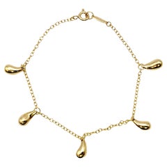 Tiffany & Co. Elsa Peretti: 18 Karat Gelbgold Teardrop Station Kette Armband