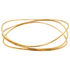 Tiffany & Co. Elsa Peretti 18 Karat Yellow Gold Three Wave Bangle Bracelet