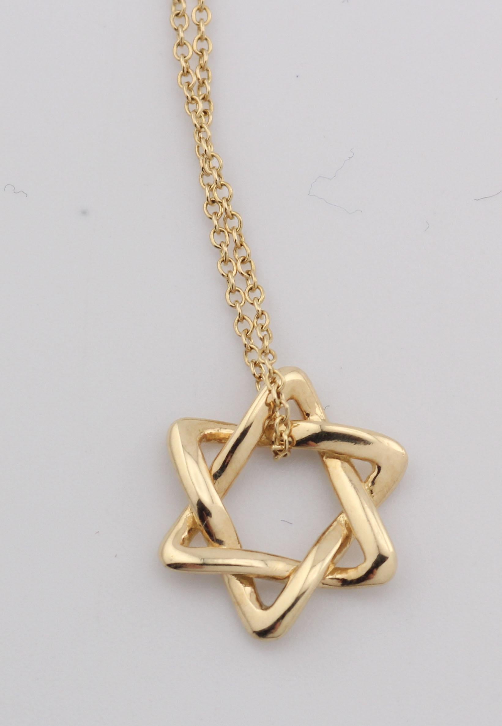 Maybe??


The Tiffany 
Co. Elsa Peretti Star of David 18K Yellow Gold Necklace Pendant is a dazzling and meaningful piece of jewelry that beautifully combines iconic design with exquisite craftsmanship. This pendant is part of the celebrated