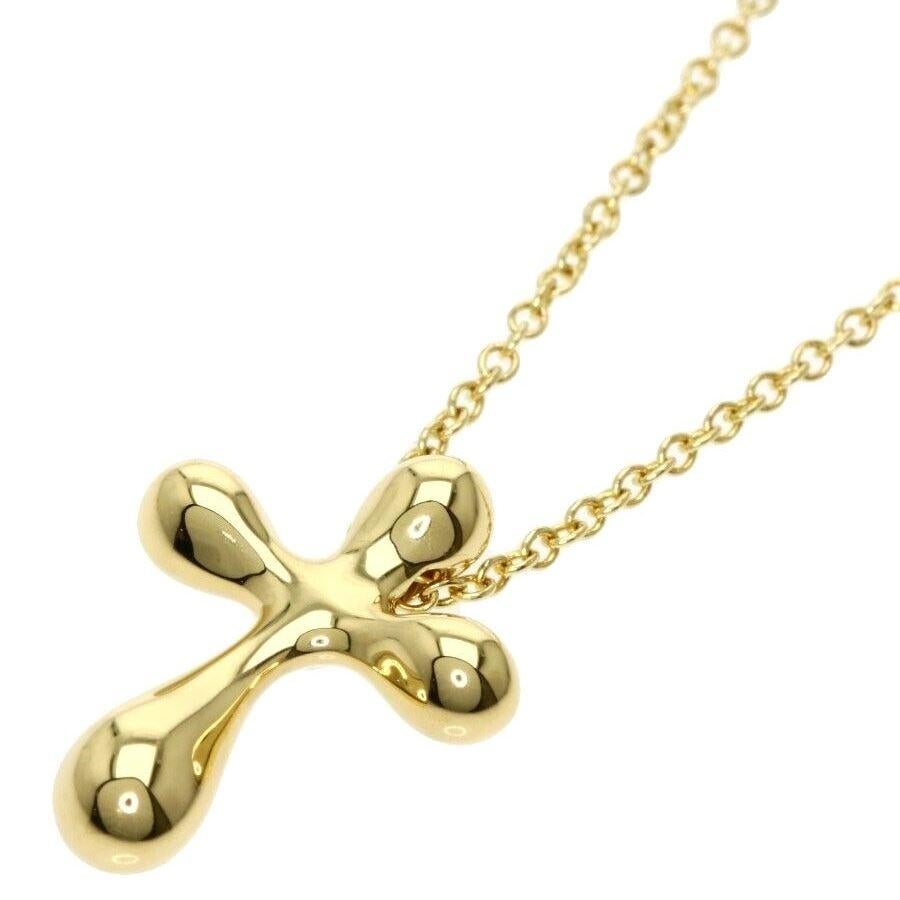 TIFFANY & Co. Elsa Peretti 18K Gold 12mm Wide Cross Pendant Necklace 

Metal: 18K yellow gold
Weight: 4.30 grams 
Chain: 16