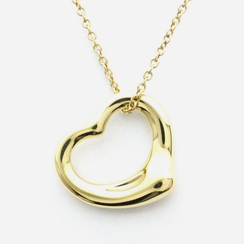 TIFFANY & Co. Elsa Peretti 18K Gold 16mm Open Heart Pendant Necklace

Metal: 18K Yellow Gold
Weight: 3.90 grams
Chain: 16