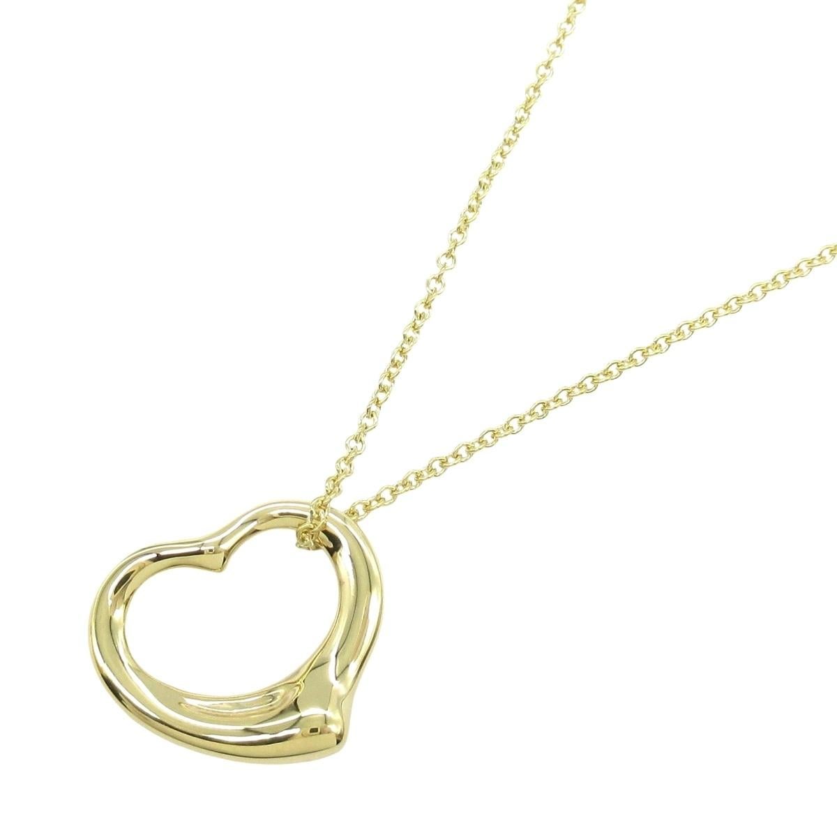 TIFFANY & Co. Collana con ciondolo a cuore aperto Elsa Peretti in oro 18 carati da 16 mm

Metallo: Oro giallo 18 carati
Peso: 4.10 grammi
Catena: 16