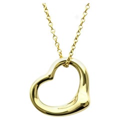 TIFFANY 
Co. Elsa Peretti 18K Gold 16mm Open Heart Pendant Necklace