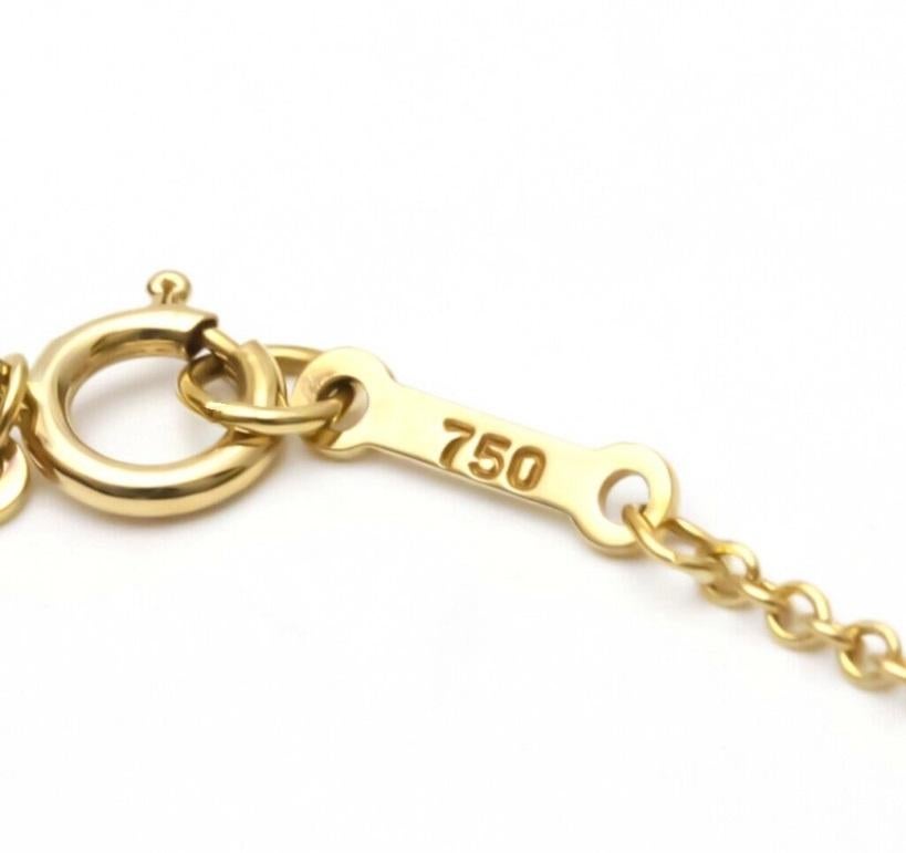 TIFFANY & Co. Elsa Peretti 18K Gold .20ct Diamond Cross Pendant Necklace For Sale 2