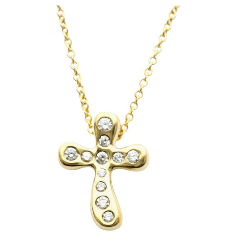 TIFFANY & Co. Elsa Peretti 18K Gold .20ct Diamond Cross Pendant Necklace For Sale