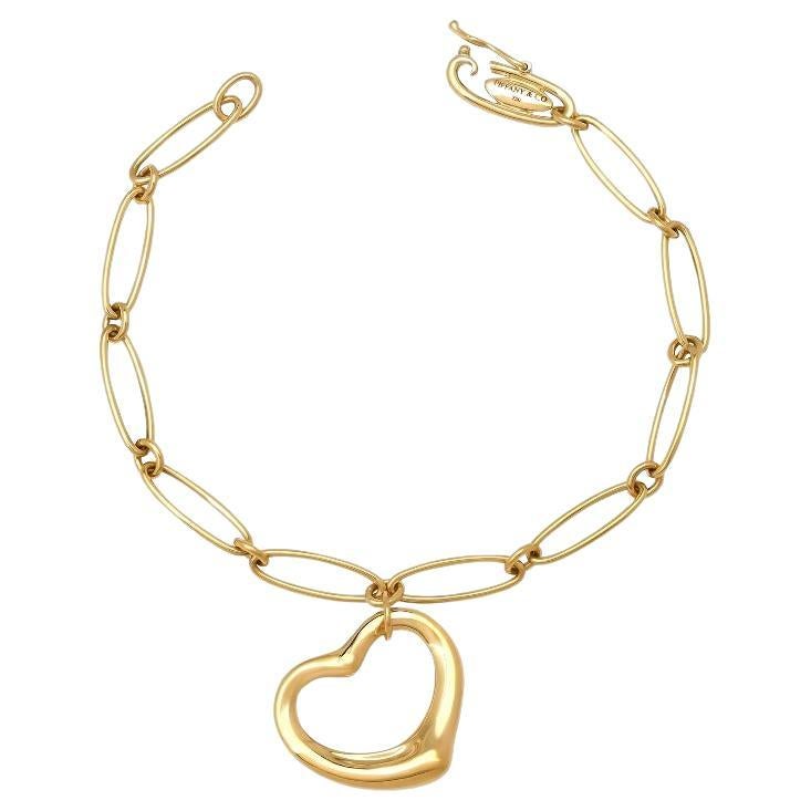 TIFFANY & Co. Elsa Peretti - Bracelet à maillons ovales en or 18K avec breloques en forme de cœur ouvert de 22 mm