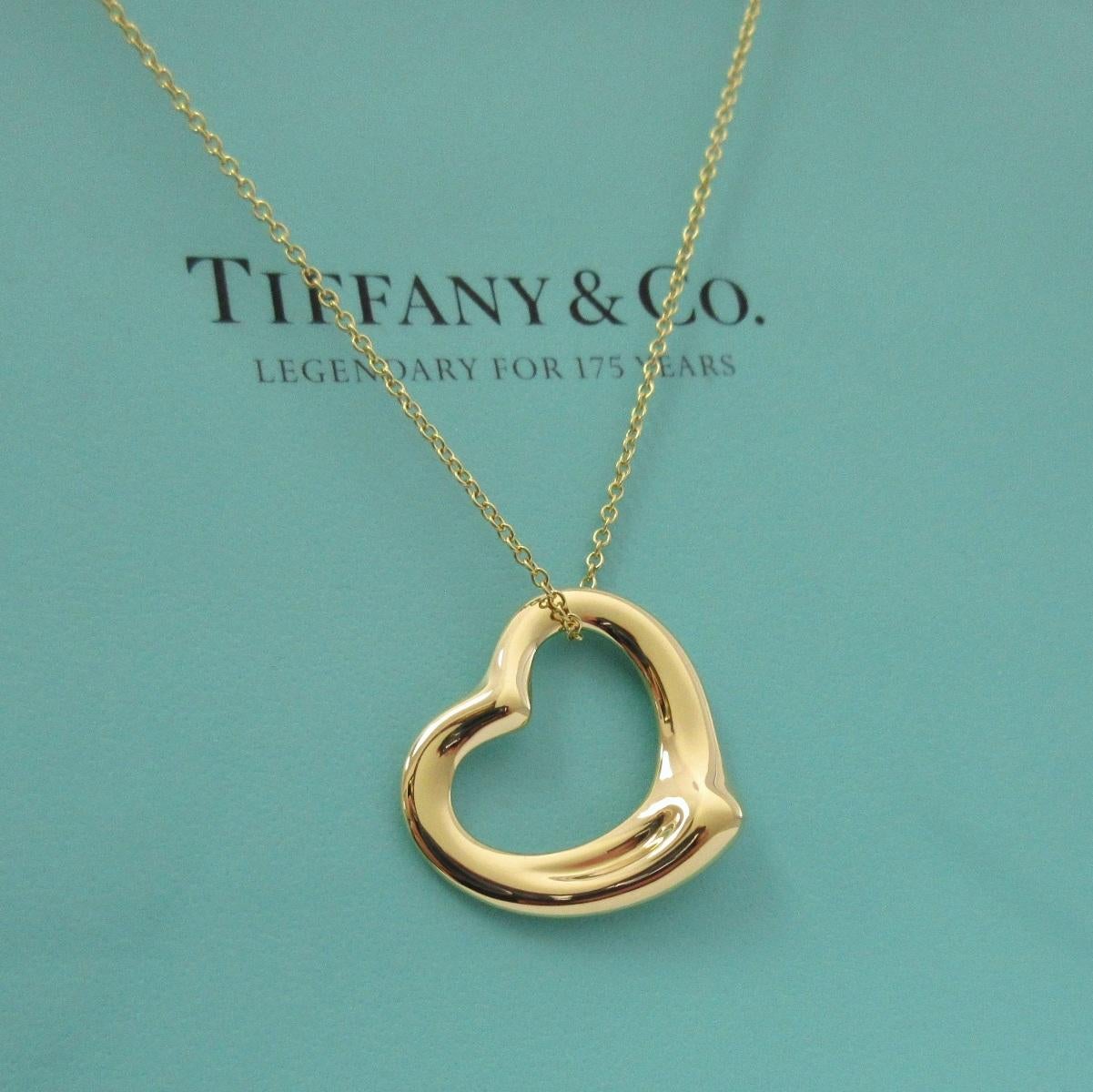 TIFFANY & Co. Elsa Peretti 18K Gold 22mm Open Heart Pendant Necklace

Metal: 18K Yellow Gold
Chain: 16