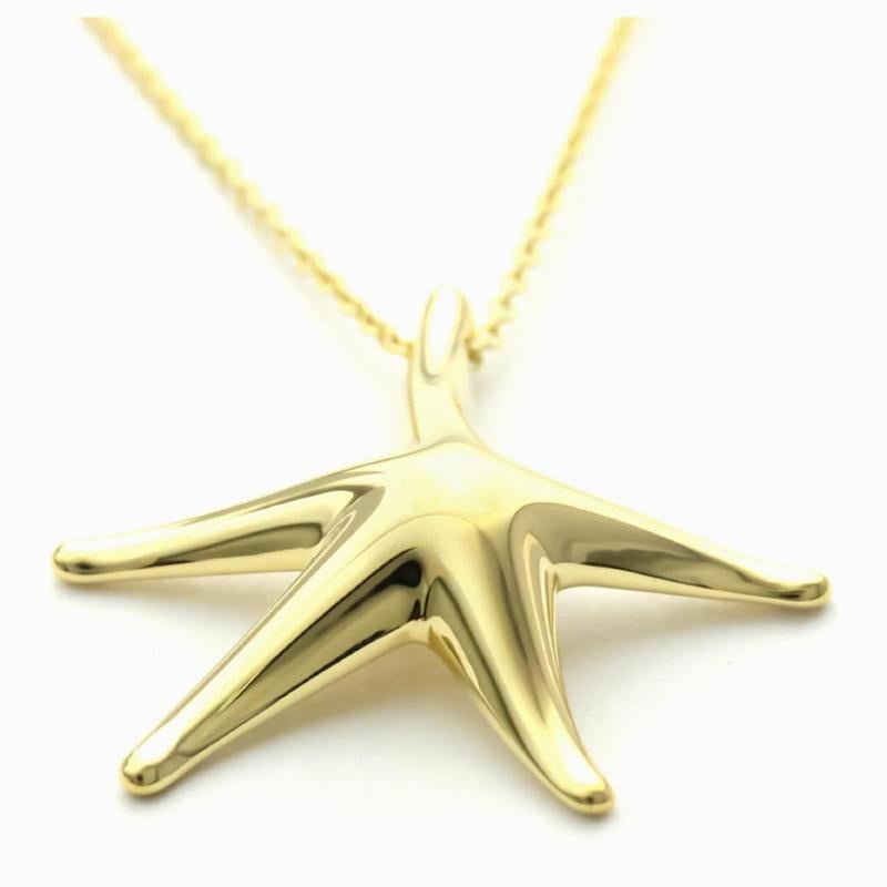 TIFFANY & Co. Collana con ciondolo a forma di stella marina in oro 18 carati da 28 mm di Elsa Peretti In condizioni Nuovo in vendita a Los Angeles, CA
