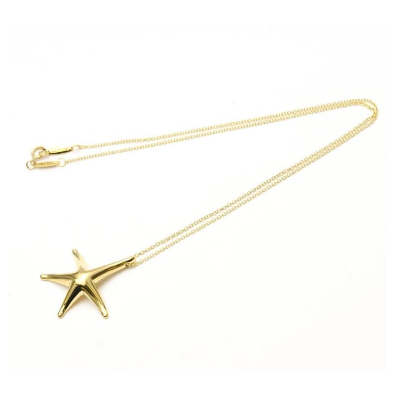 TIFFANY & Co. Collana con ciondolo a forma di stella marina in oro 18 carati da 28 mm di Elsa Peretti in vendita 1