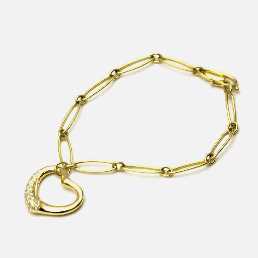 TIFFANY & Co. Elsa Peretti 18K Gold .36ct Diamond Open Heart Charm Bracelet

Metal: 18K Yellow Gold
Length: 7