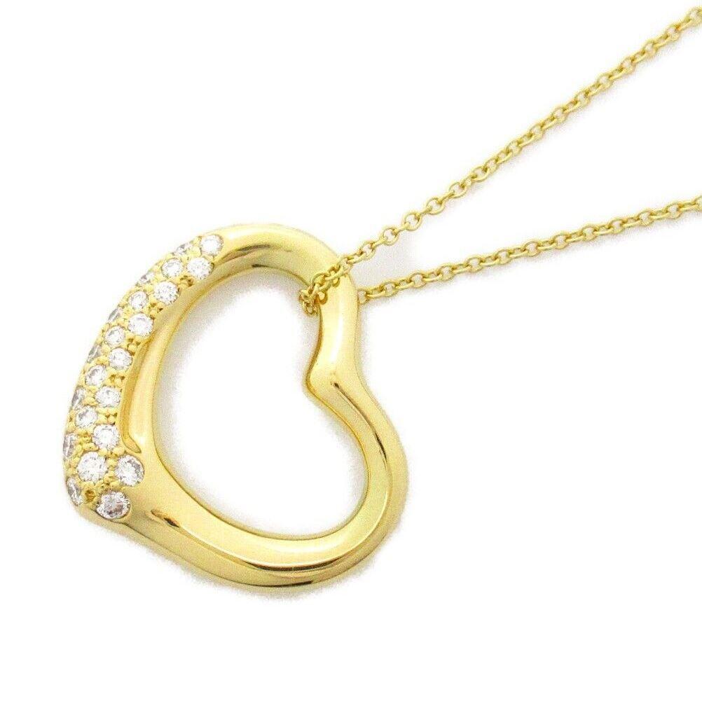 TIFFANY & Co. Elsa Peretti 18K Gold .38ct Diamond Open Heart Pendant Necklace 

Metal: 18K Yellow Gold
Weight: 8.30 grams 
Chain: 16