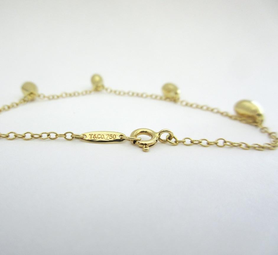 TIFFANY & Co. Elsa Peretti Bracelet à cinq breloques en or 18K 7