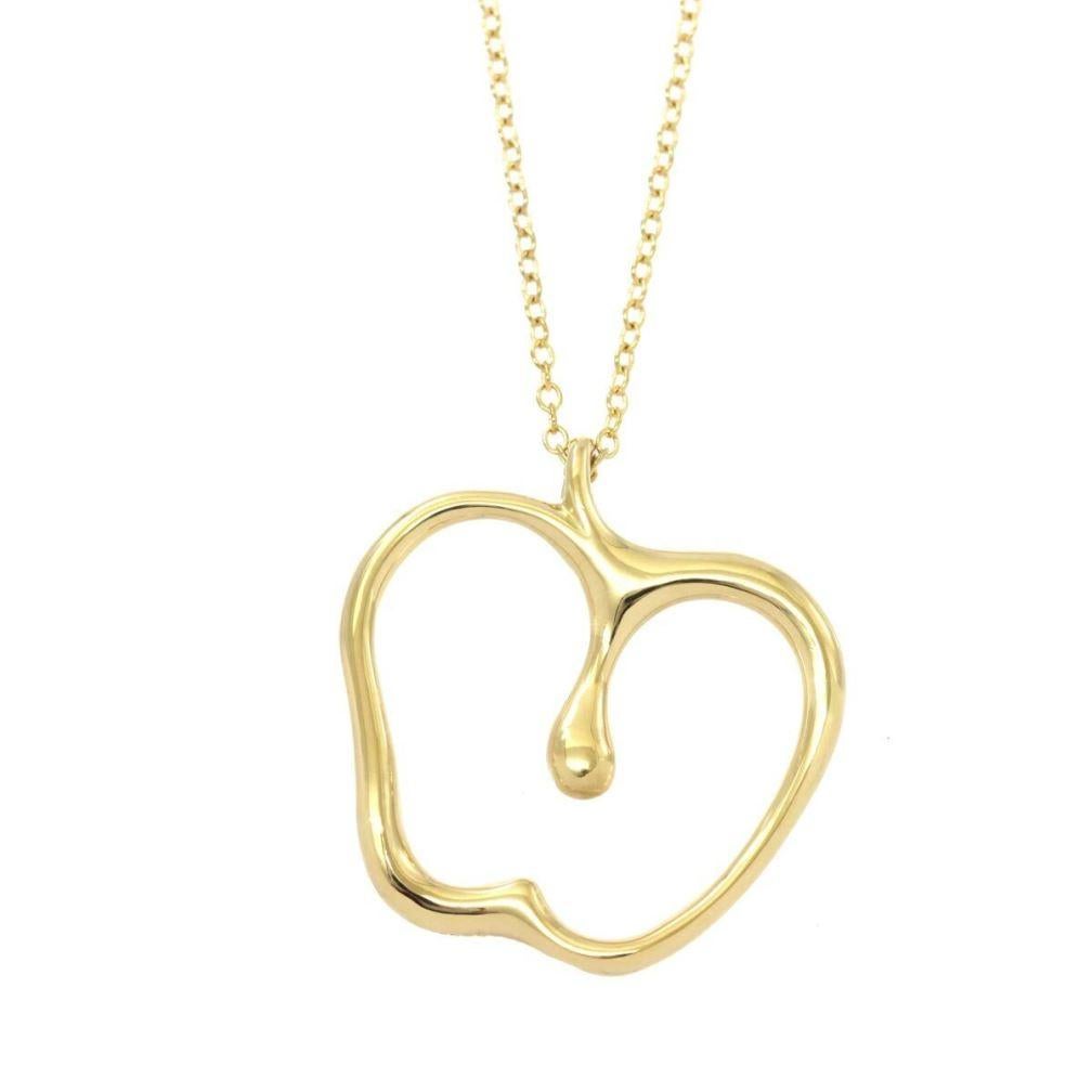 TIFFANY & Co. Elsa Peretti 18K Gold Apple Pendant Necklace 

Metal: 18K yellow gold
Weight: 3.60 grams 
Chain: 16