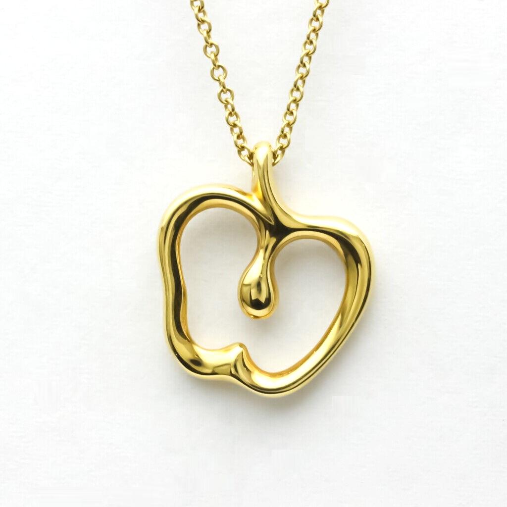 TIFFANY & Co. Elsa Peretti 18K Gold Apple Pendant Necklace

Metal: 18K Yellow Gold
Chain: 16