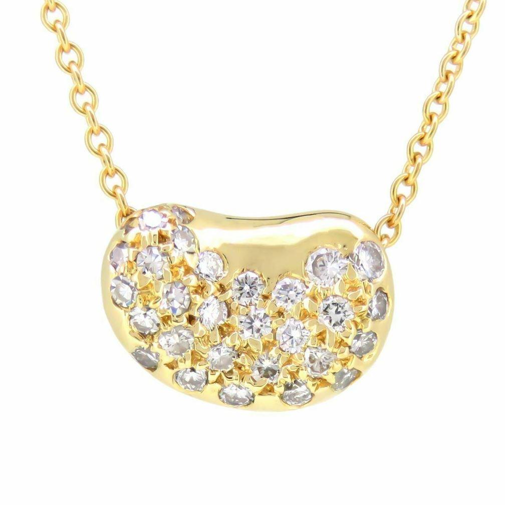 TIFFANY & Co. Elsa Peretti 18K Gold Diamond 11mm Bean Pendant Necklace 

Metal: 18K yellow gold 
Chain: 16