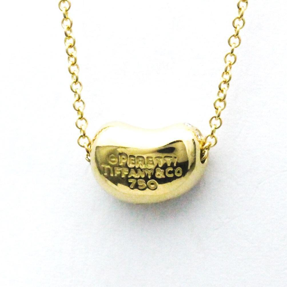 Women's TIFFANY & Co. Elsa Peretti 18K Gold Diamond 11mm Bean Pendant Necklace