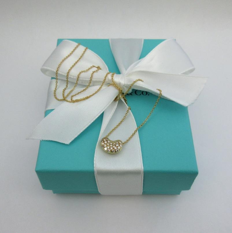 TIFFANY & Co. Elsa Peretti 18K Gold Diamond 11mm Bean Pendant Necklace For Sale 2