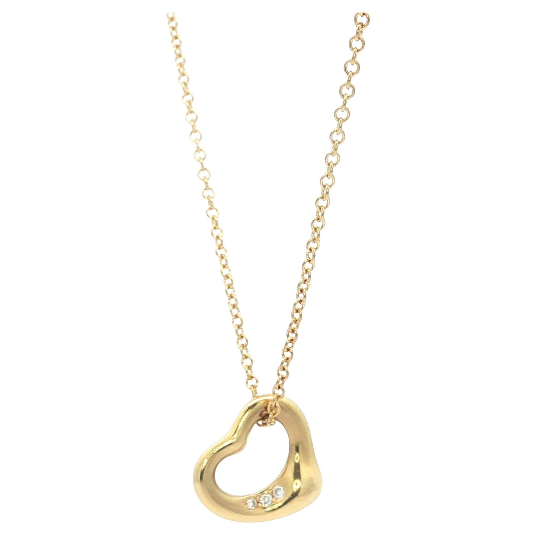Tiffany 
Co. Elsa Peretti 18k Gold Diamond 11mm Open Heart Pendant Necklace