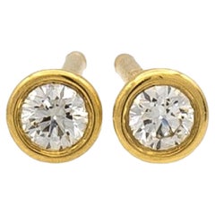 Tiffany & Co. Clous d'oreilles Elsa Peretti en or 18 carats et diamants