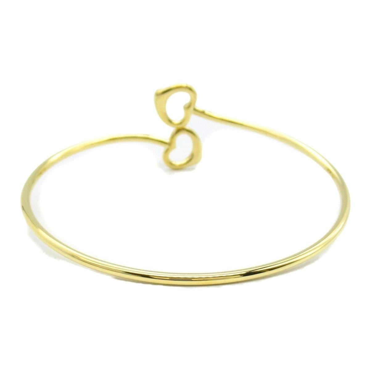 Donna TIFFANY & Co. Bracciale con doppio cuore aperto in oro 18 carati di Elsa Peretti in vendita