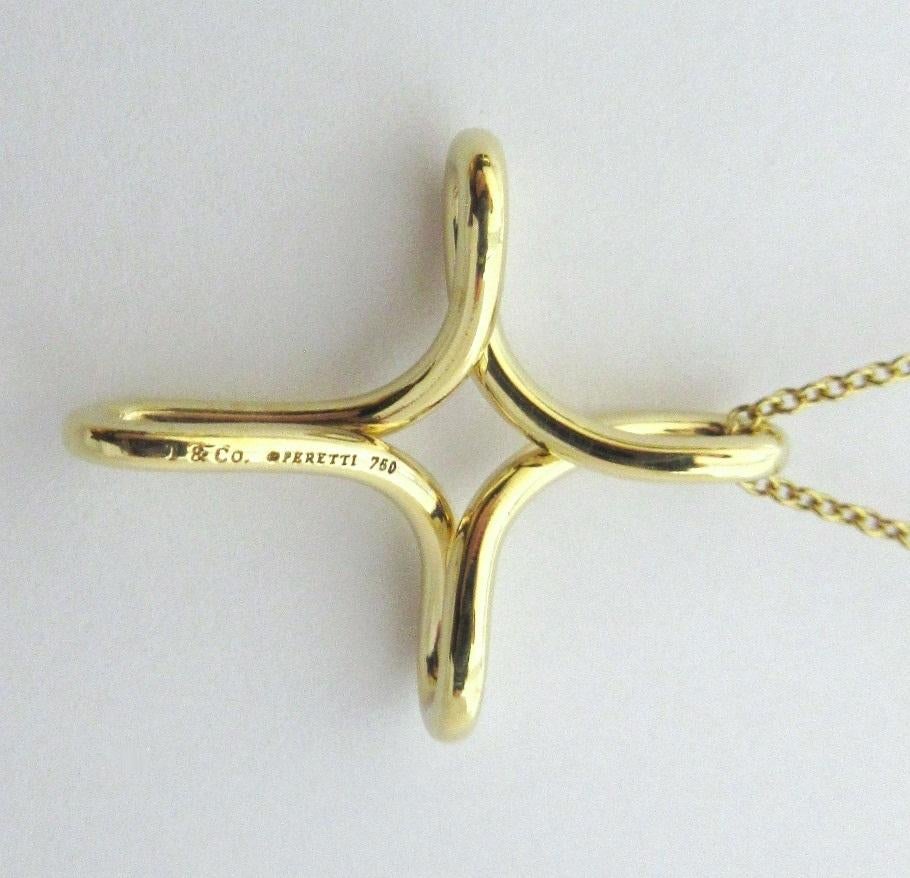 TIFFANY & Co. Elsa Peretti 18K Gold Infinity Cross Pendant Necklace Medium For Sale 1