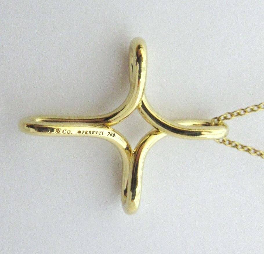 Women's TIFFANY & Co. Elsa Peretti 18K Gold Infinity Cross Pendant Necklace Medium For Sale