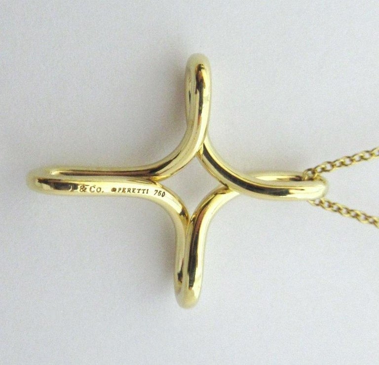 TIFFANY and Co. Elsa Peretti 18K Gold Infinity Cross Pendant