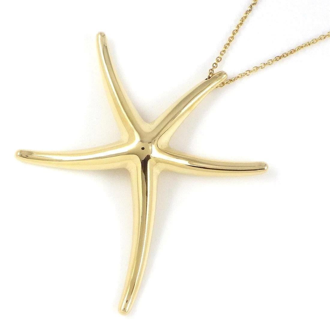 TIFFANY & Co. Elsa Peretti 18K Gold Seestern-Anhänger Halskette LARGE
   
Metall: 18K Gelbgold
Gewicht: 7.70 Gramm
Kette: 18