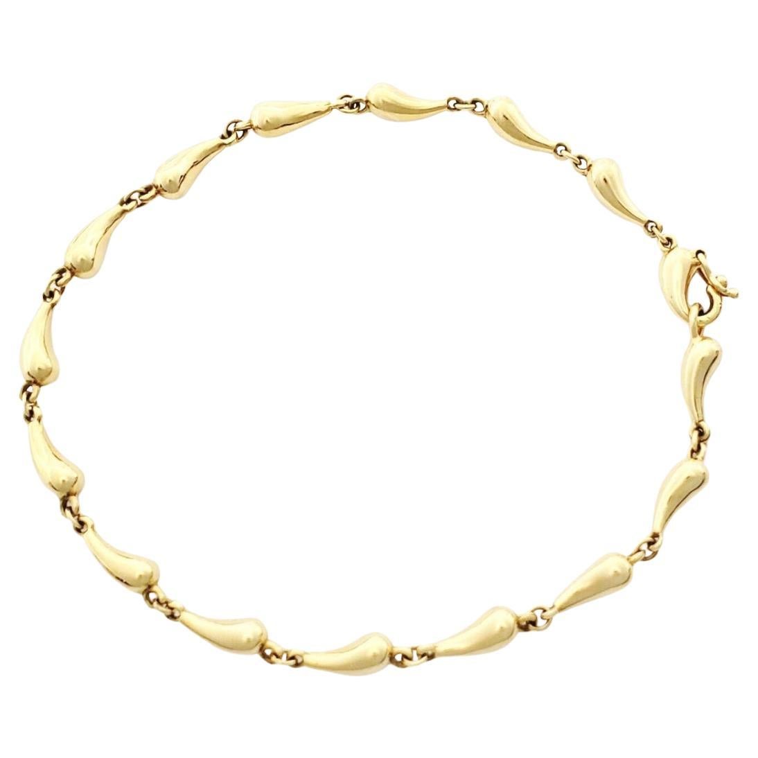 How can you tell if a Tiffany bean necklace is real?