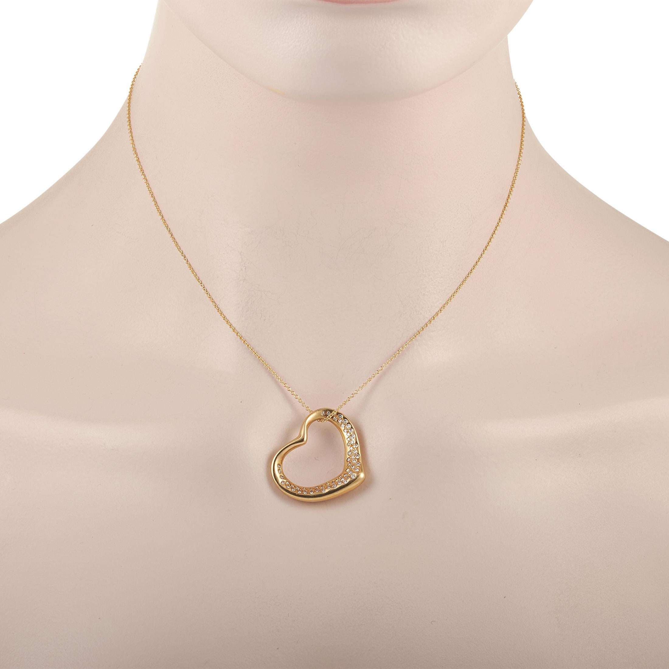 Celebrate love with this Tiffany & Co. Elsa Peretti 18K Yellow Gold 0.75 ct Diamond Heart Pendant Necklace. Whether given as an anniversary present or as a fancy little treat for yourself, this piece of jewelry is guaranteed to bring delight. The