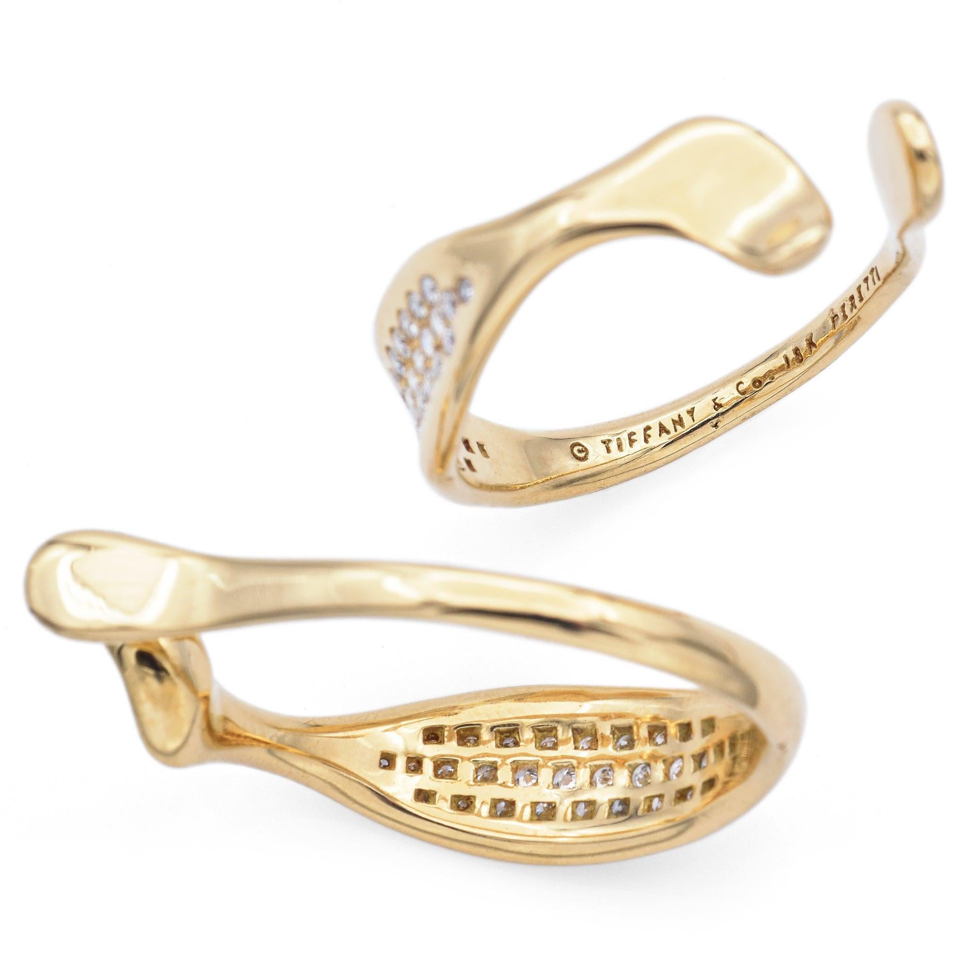 Peso: 18.0 grammi
A. Stone: Circa 0,89 TCW (0,01-0,015 ct) di diamanti
Misure: 34 x 26 x 9 mm
Marchio di fabbrica: Tiffany & Co. Elsa Peretti 18K

ARTICOLO #: BR-1218-030624-20