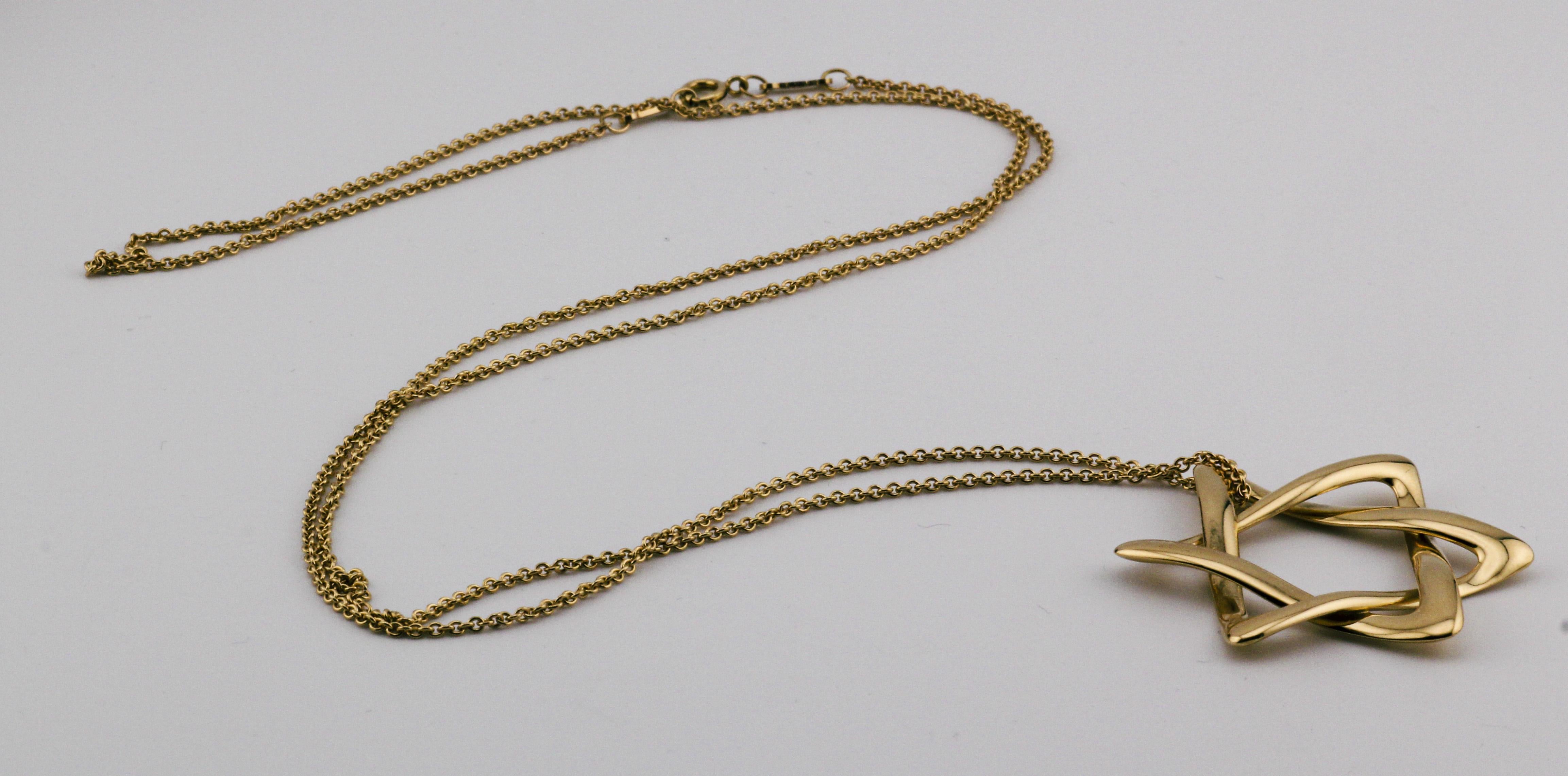Tiffany & Co. Elsa Peretti, collana con ciondolo a forma di stella di David da 40 mm in oro giallo 18 carati In condizioni buone in vendita a Simpsonville, SC