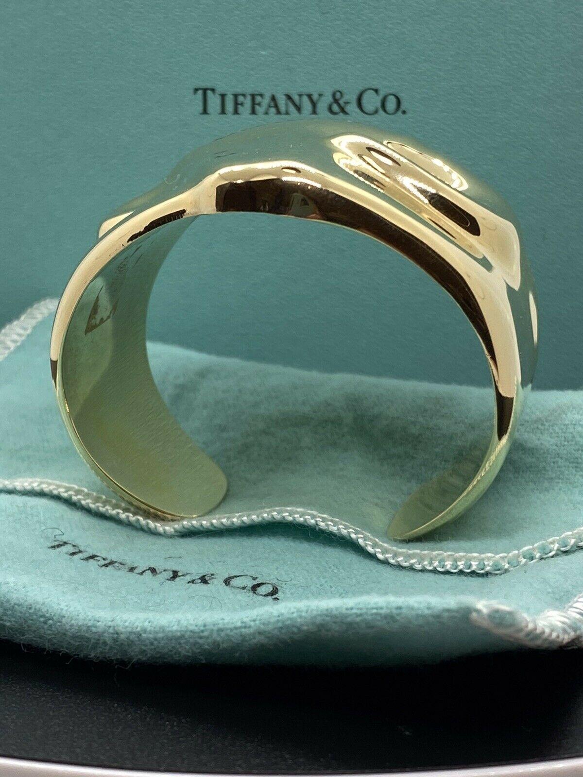 Tiffany & Co. Elsa Peretti 18k Yellow Gold Abstract Taurus Cuff Bangle, C. 1978 In Excellent Condition In Beverly Hills, CA