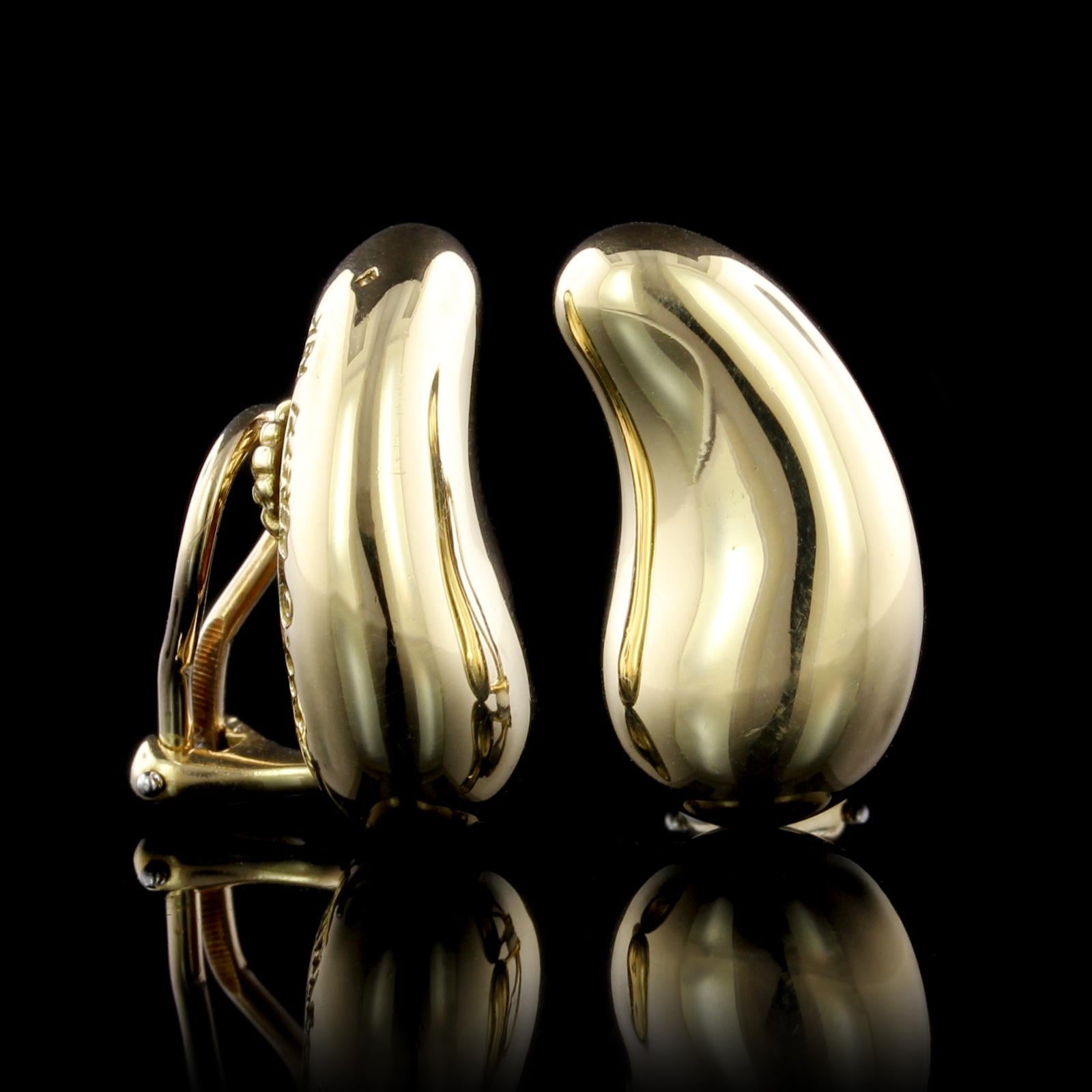 Tiffany & Co. Elsa Peretti 18K Yellow Gold Bean Earrings. Each earring is bean
shape, length 7/8