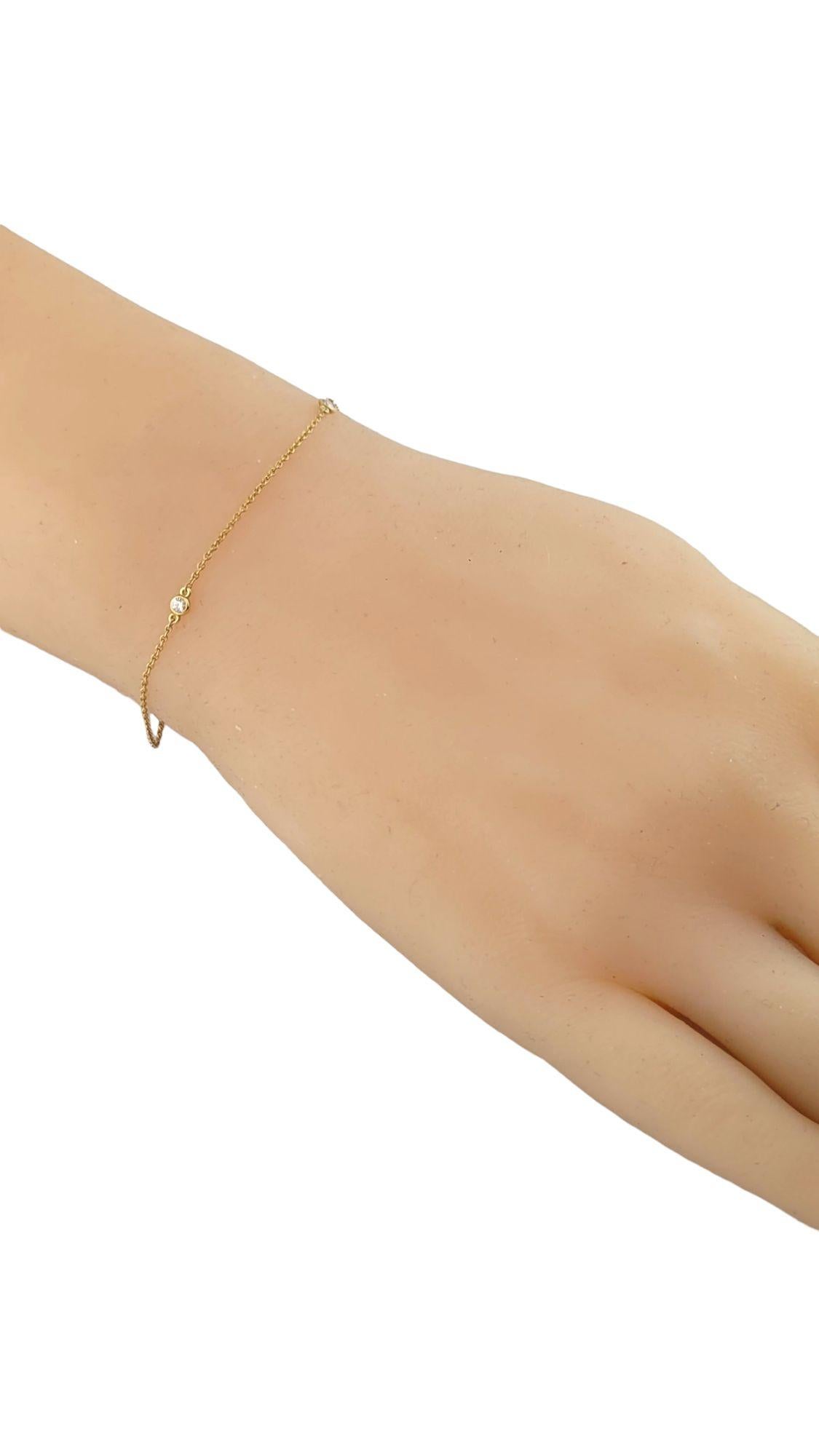 Tiffany & Co. Elsa Peretti 18K Yellow Gold Chain Diamond by Yard Bracelet

Gorgeous Tiffany & Co. 18K gold chain bracelet featuring 3 sparkling, round cut diamonds!

Approximate total diamond weight: 0.30 cts

Diamond clarity: VS1

Diamond color: