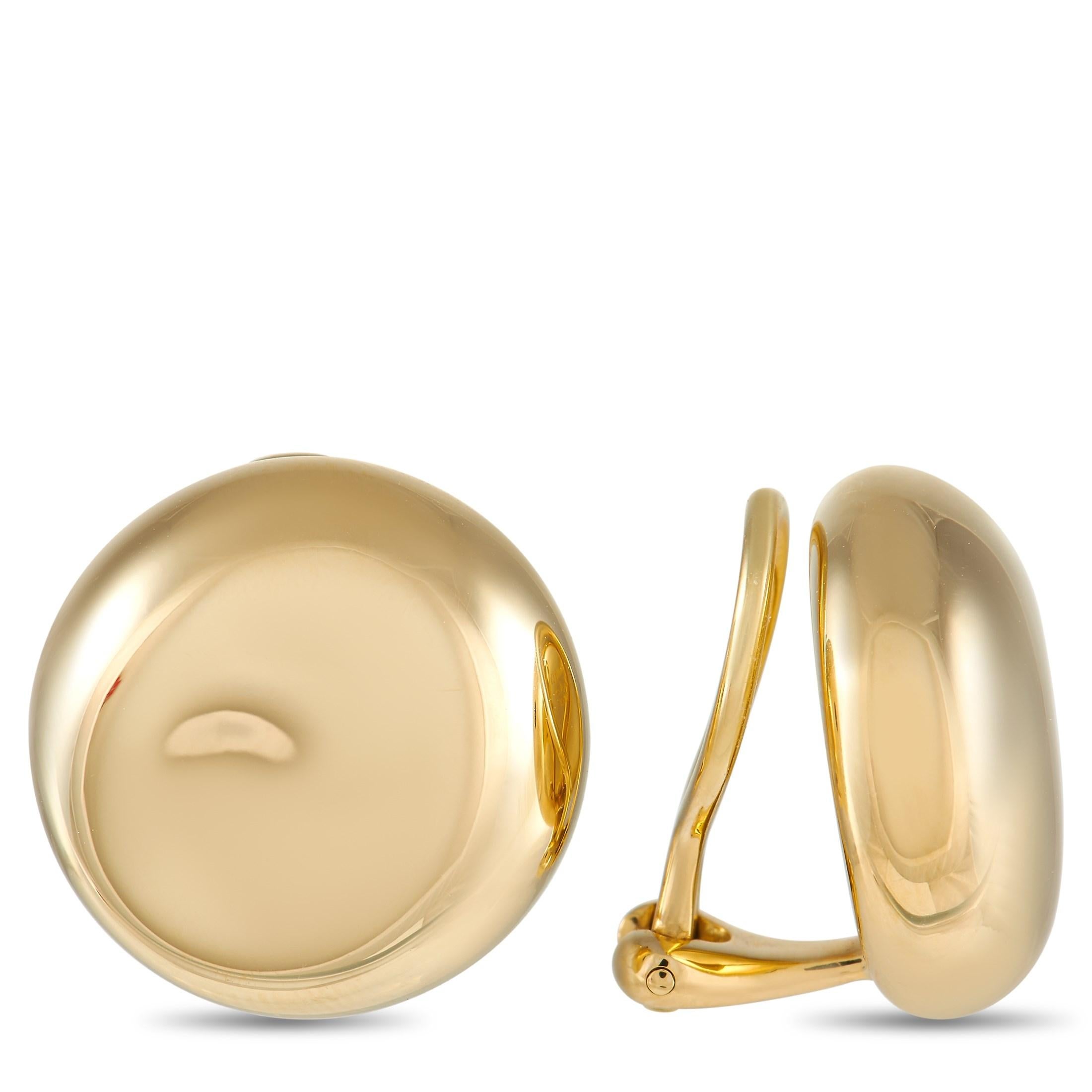 Punctuate your outfits with the simplistic sophistication of this Tiffany & Co. Elsa Peretti 18K Yellow Gold Clip-on Dot Earrings. Each clip-on earring measures about an inch in diameter and has an ellipsoid button-like shape. It is fashioned from