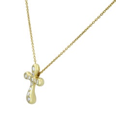 Tiffany & Co. Elsa Peretti 18 Karat Yellow Gold Diamond Cross Pendant 0.25 Carat