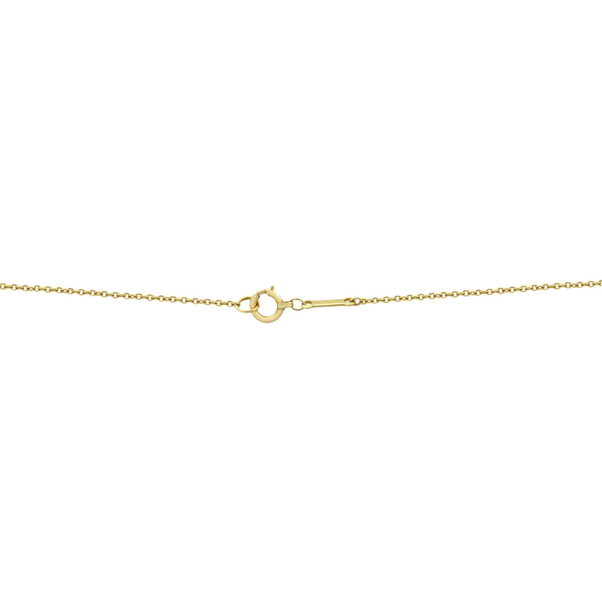 Round Cut Tiffany & Co. Elsa Peretti 18 Karat Yellow Gold Diamond Cross Pendant 0.25 Carat