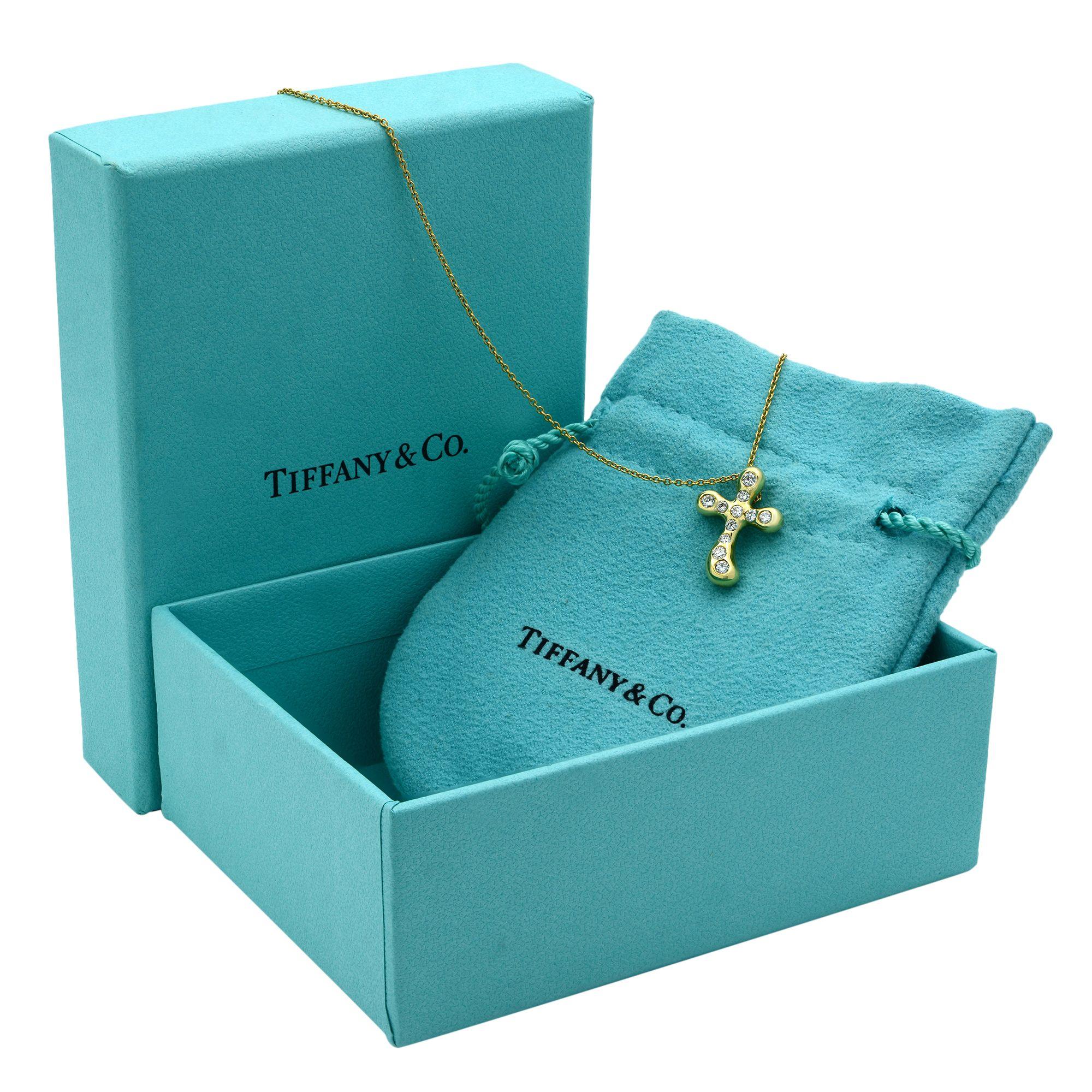 Tiffany & Co. Elsa Peretti 18 Karat Yellow Gold Diamond Cross Pendant 0.25 Carat In Excellent Condition In New York, NY