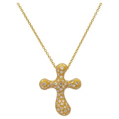 Tiffany & Co. Collar colgante con cruz de diamantes y pavé Elsa Peretti de oro amarillo de 18 quilates
