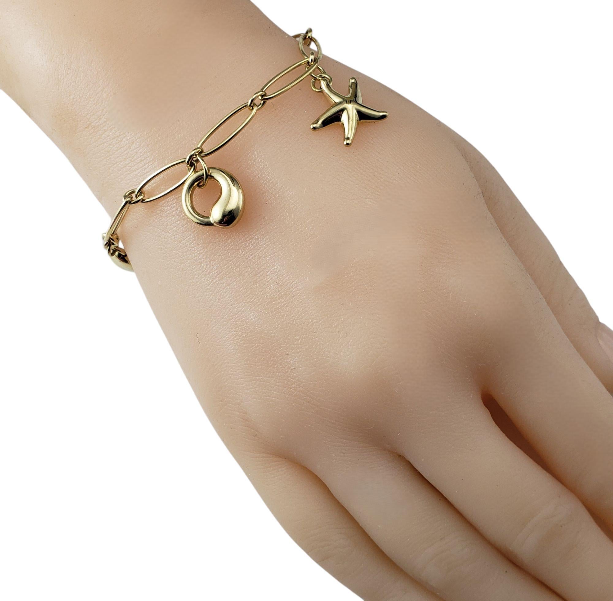Tiffany & Co. Elsa Peretti Bracelet à breloques iconique en or jaune 18 carats n° 21551 en vente 4