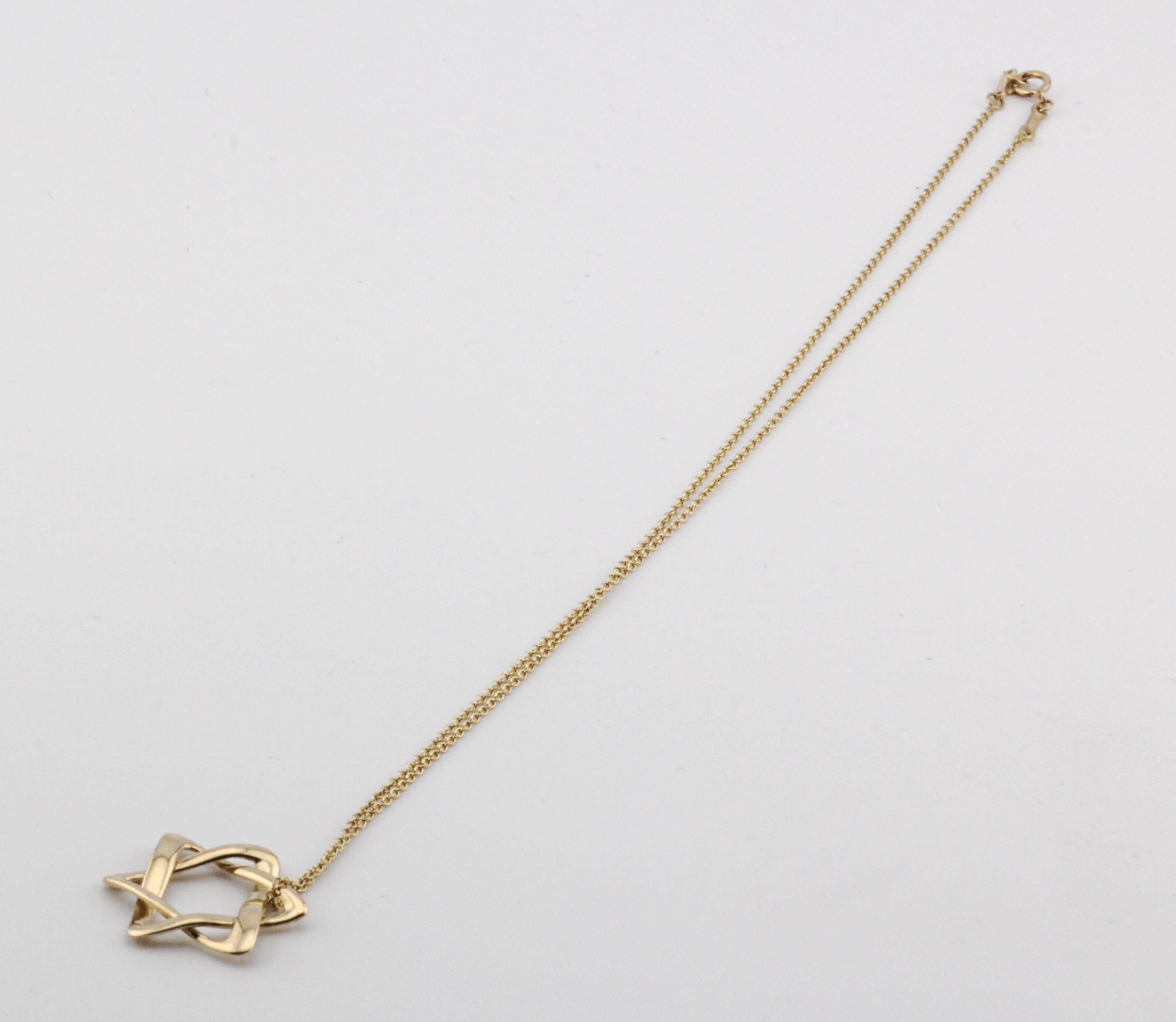 Tiffany & Co. Elsa Peretti 18K Yellow Gold Large Star of David Pendant Necklace In Good Condition For Sale In Bellmore, NY