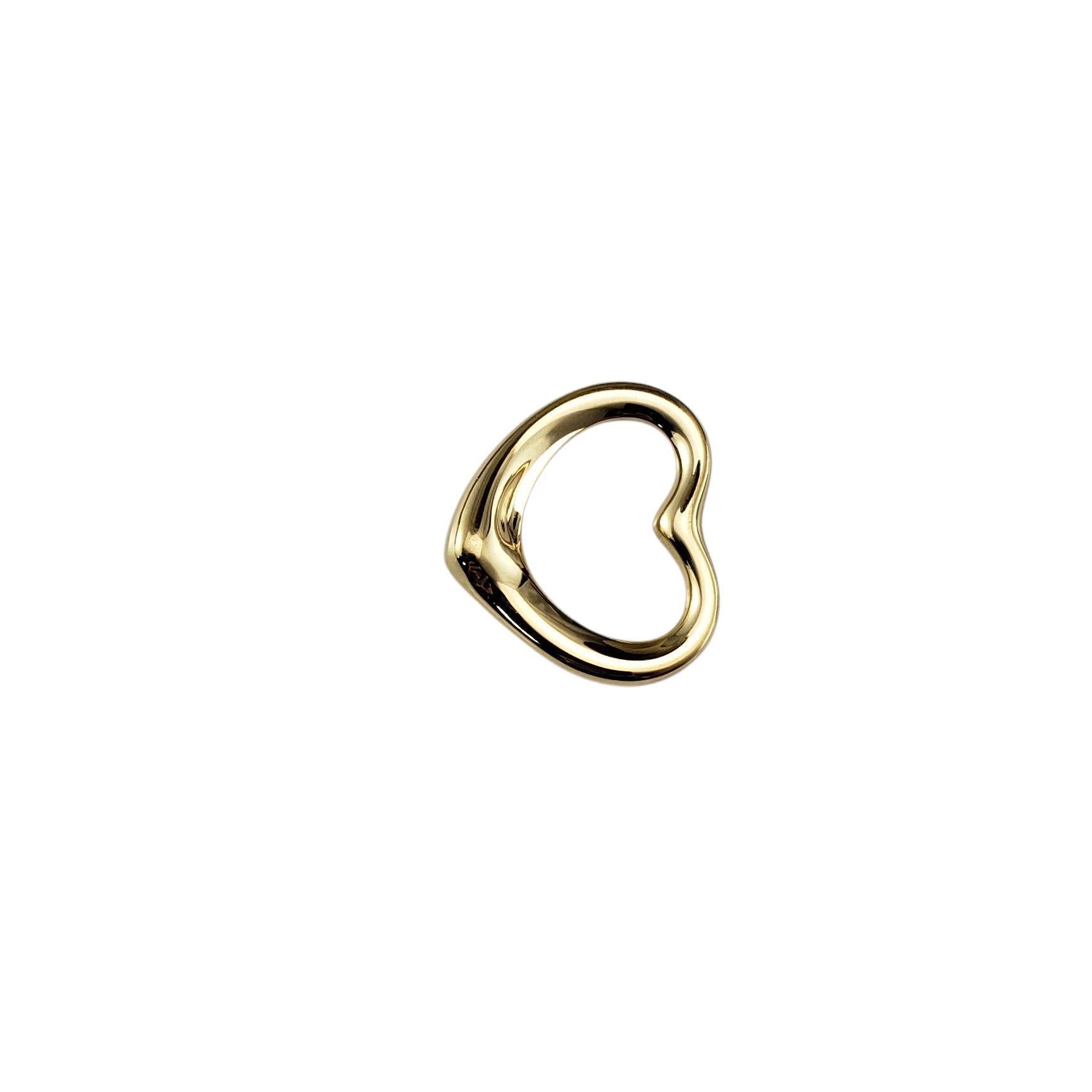 Tiffany & Co. Elsa Peretti Pendentif en or jaune 18K en forme de coeur ouvert

Intemporel et emblématique, cet élégant pendentif présente un cœur ouvert sculptural, signature du célèbre style de Peretti - élégant, fluide et symbolique de