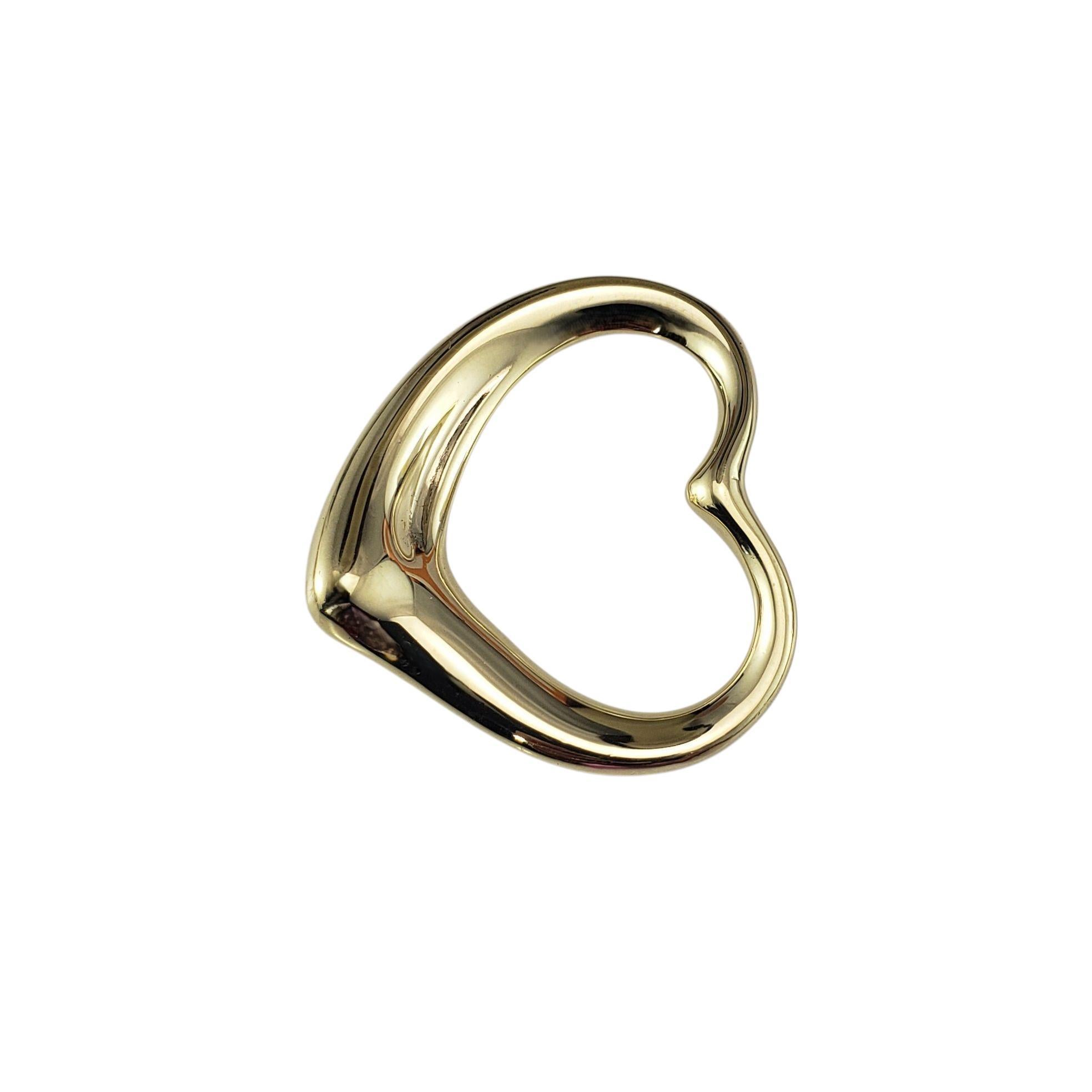 Tiffany & Co. Elsa Peretti Pendentif en or jaune 18K en forme de coeur ouvert

Ce cœur ouvert emblématique d'Elsa Peretti capture le style minimaliste caractéristique de la créatrice - fluide, moderne et immédiatement reconnaissable. Cette élégante