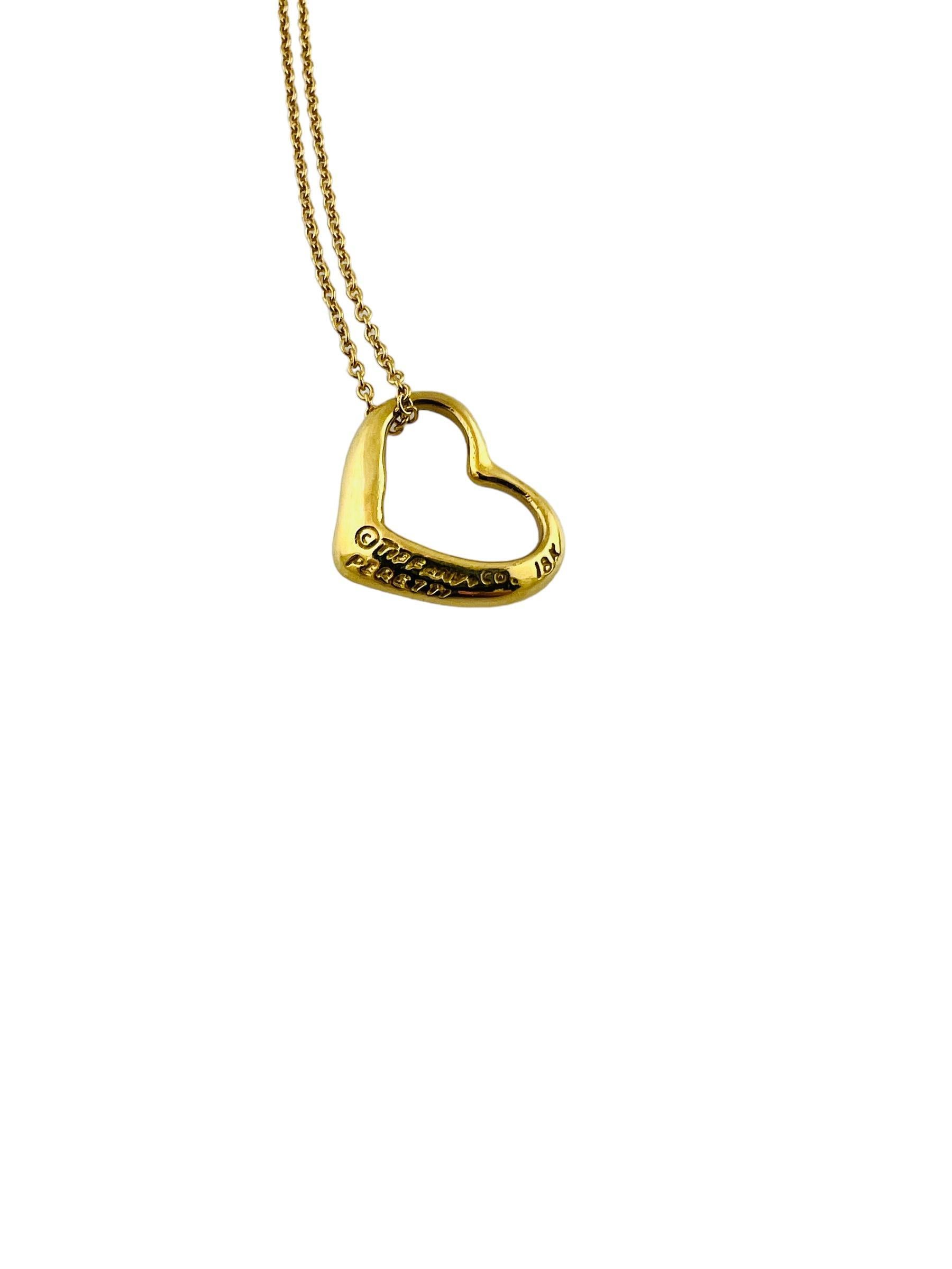 Tiffany & Co. Elsa Peretti 18K Yellow Gold Open Heart Pendant Necklace

This classic Tiffany & Co. open heart pendant necklace was designed by Elsa Peretti.

Tiffany chain is approx. 16