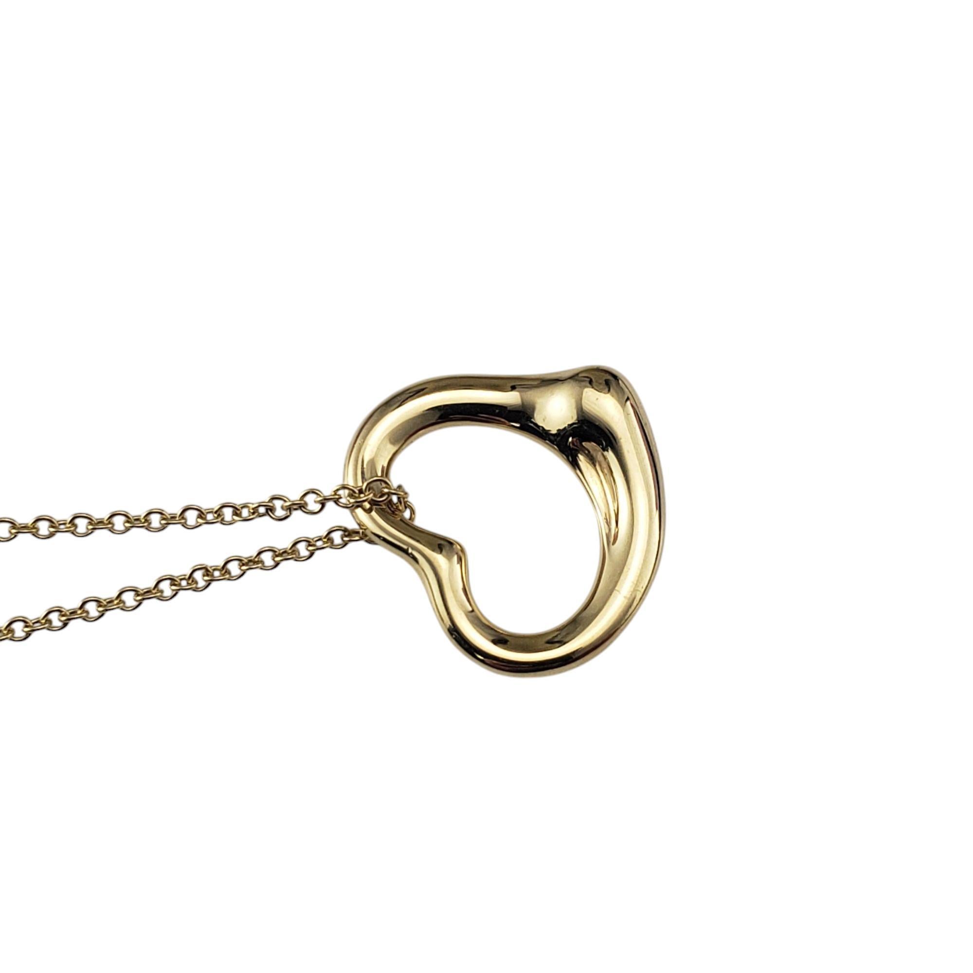 Contemporary Tiffany & Co. Elsa Peretti 18K Yellow Gold Open Heart Pendant Necklace #21097 For Sale