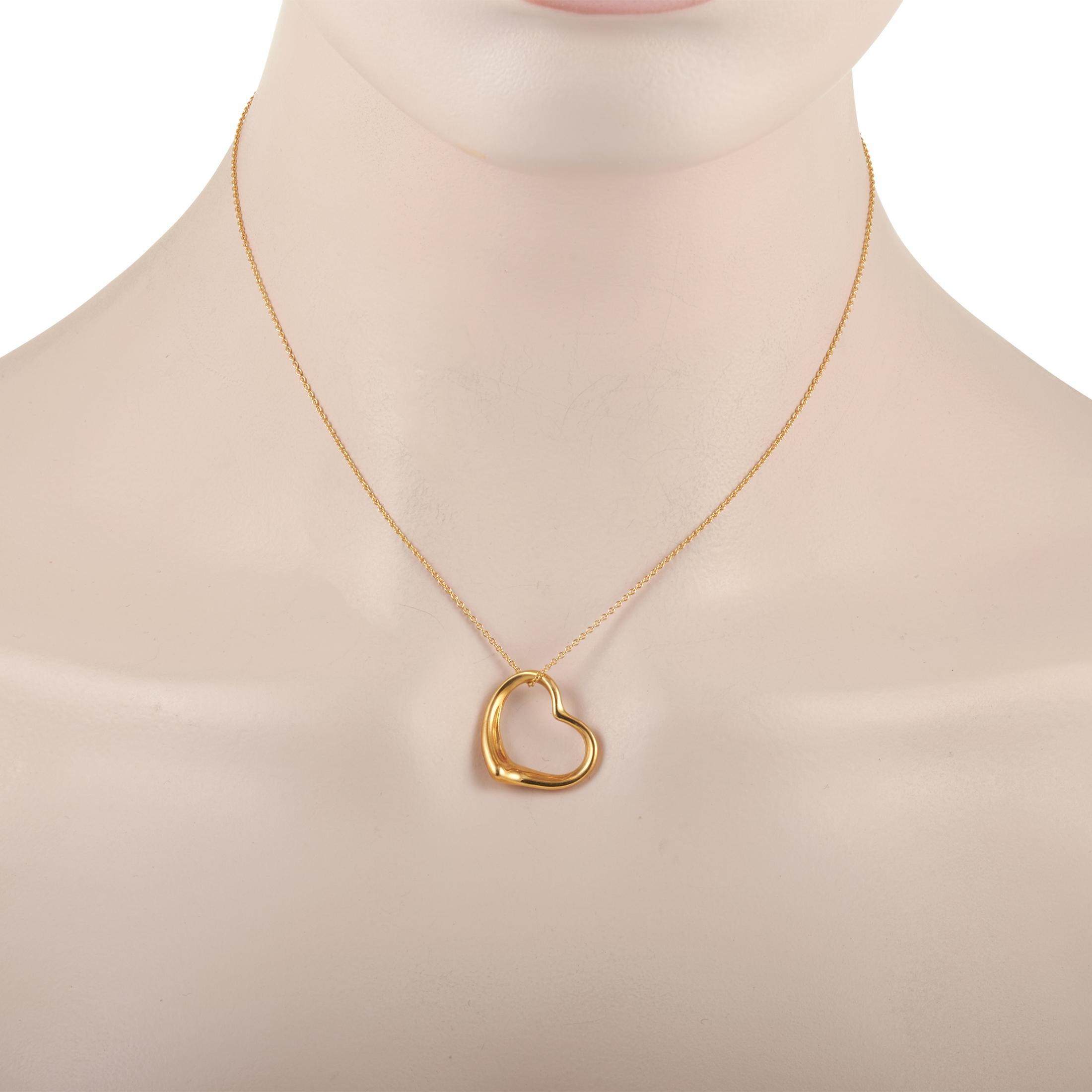 Dainty, lightweight, and pretty, the Tiffany & Co. 18K Yellow Gold Elsa Peretti Open Heart Necklace is the accessory you can wear everywhere and with any outfit. This piece of jewelry features a sculpted outline of a heart finished with a polished