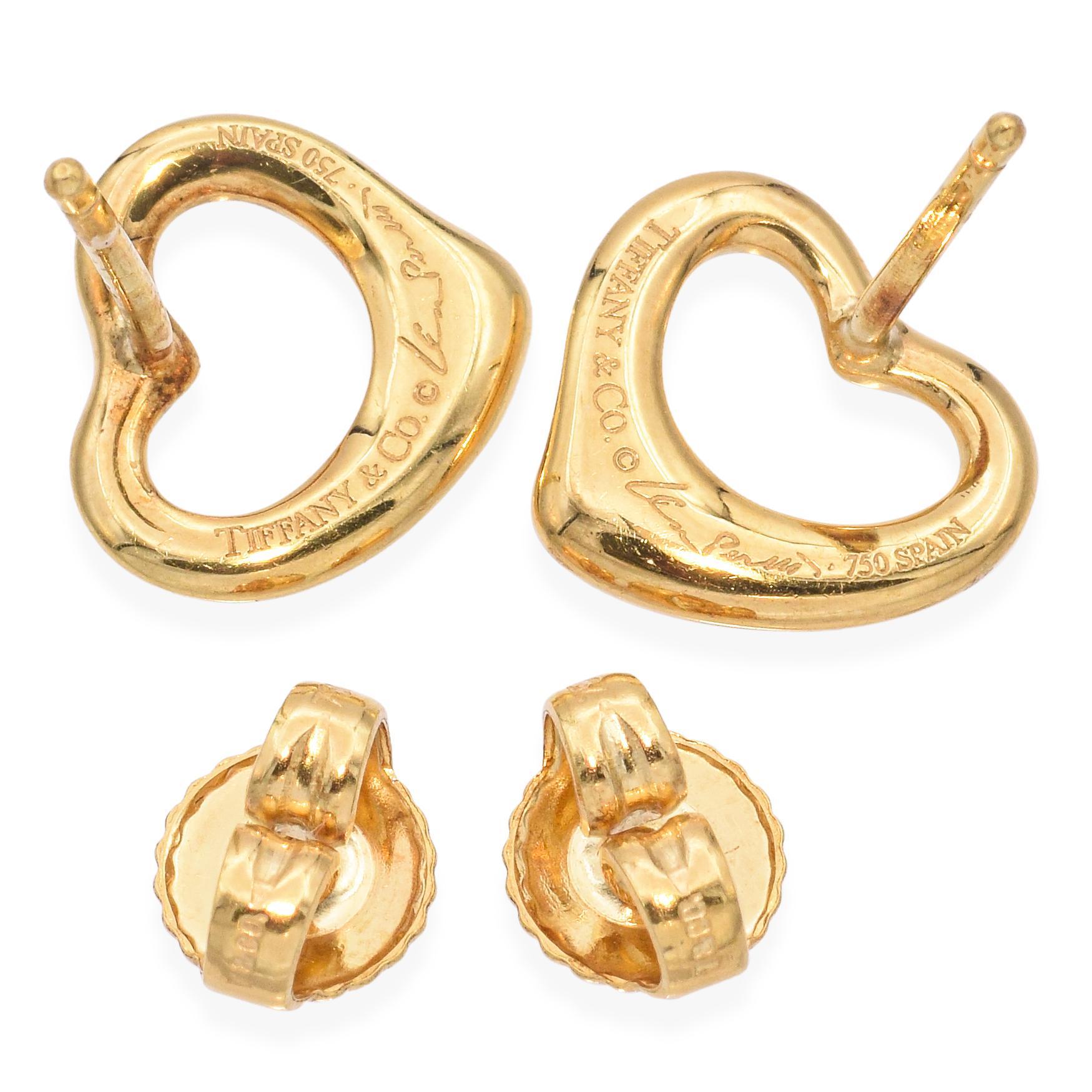 The elegant form of these 18k yellow gold open heart earrings by Elsa Peretti® for Tiffany & Co. embodies the spirit of love. Flowing curves and open spaces come together in this timeless and graceful design.

Weight: 2.9 Grams 
Measurements: 9.8 x