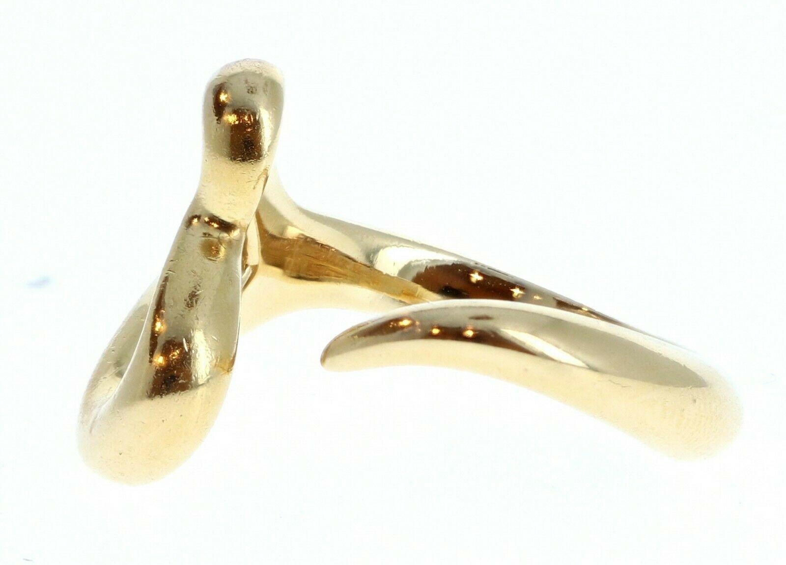 Tiffany & Co. Elsa Peretti 18K Yellow Gold Open Heart Wrap Ring Size 6.25

For sale is a Tiffany & Co Elsa Peretti 18k yellow gold open heart ring . 
 Perfect worn day or night.
 Get this stunning ring now!



Metal: PLATINUM
     
Hallmark: Tiffany