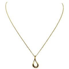 Tiffany 
Co. Elsa Peretti 18 Karat Yellow Gold Open Tear Drop Pendant Necklace